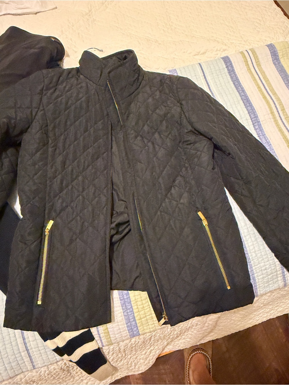 Quilted Black Zip-Front Jacket with Gold Zippers